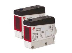 AC/DC through-beam photoelectric sensors with relay output and adjustable timer. Sensing range 20 m